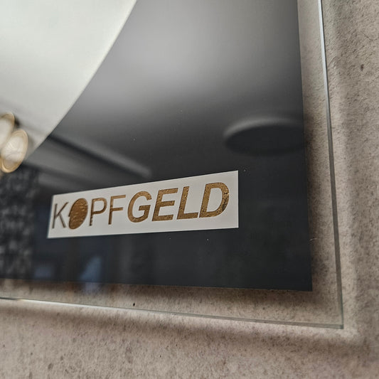 Kopfgeld - Space Gray auf Beton-Optik